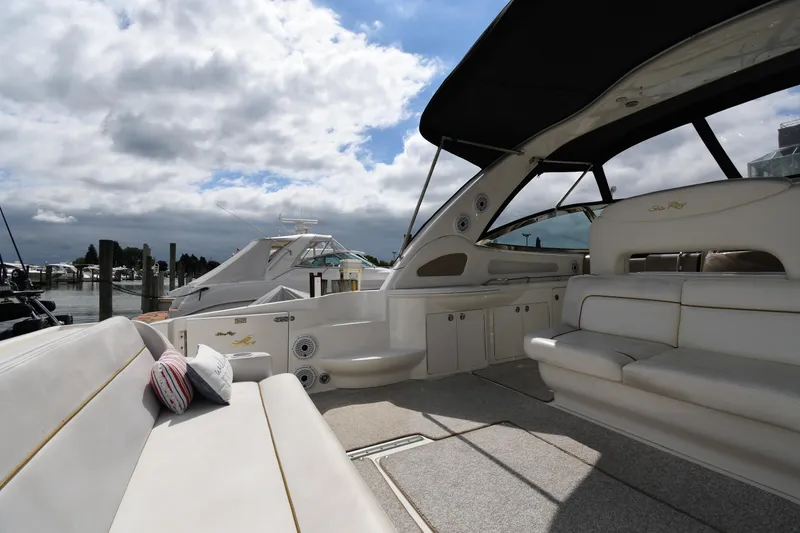 Slide: The Image of Luxurious 2000 Sea Ray 460 Sundancer yacht interior with plush seating and elegant design. - 17