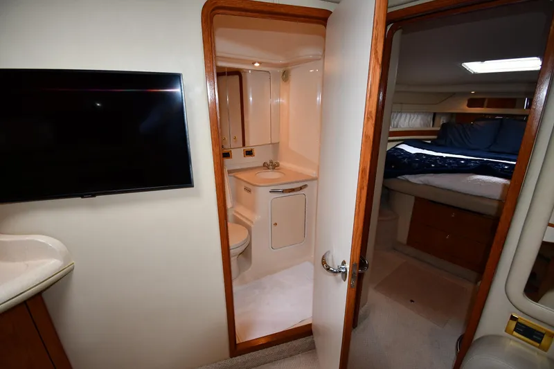 Slide: The Image of Interior of 2000 Sea Ray 460 Sundancer yacht with bathroom and bedroom. - 36