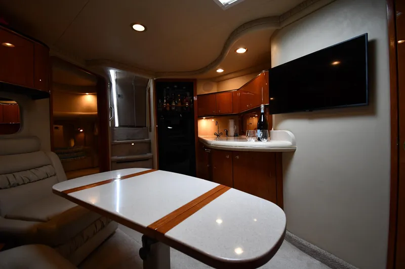 Slide: The Image of Luxurious interior of 2000 Sea Ray 460 Sundancer yacht with modern amenities and elegant design. - 39