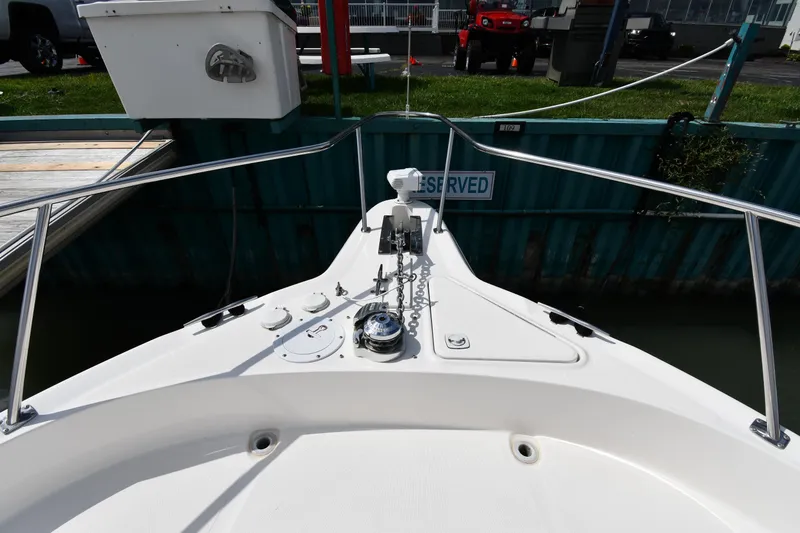 Slide: The Image of Bow view of 2000 Sea Ray 460 Sundancer docked at marina. - 4