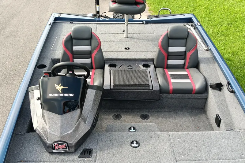 Slide: The Image of 2021 Ranger RT188P boat interior with dual seats and Humminbird console. - 10