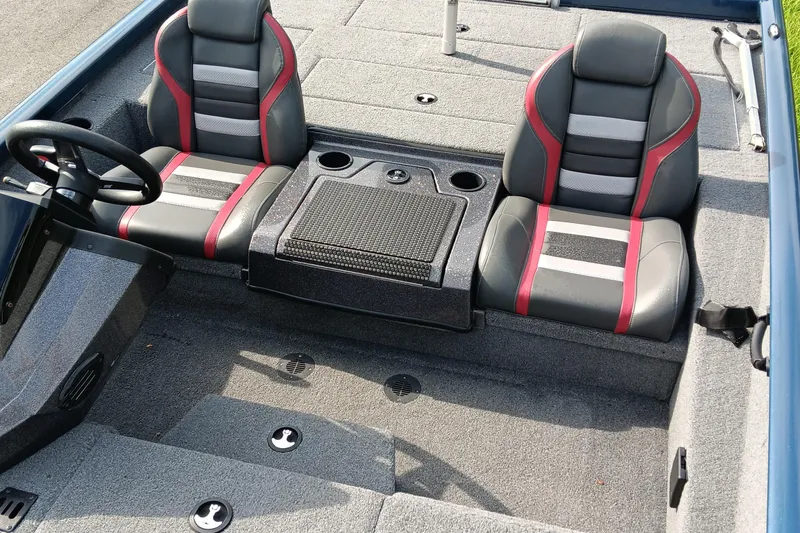 Slide: The Image of 2021 Ranger RT188P boat interior with dual seats and steering wheel. - 14