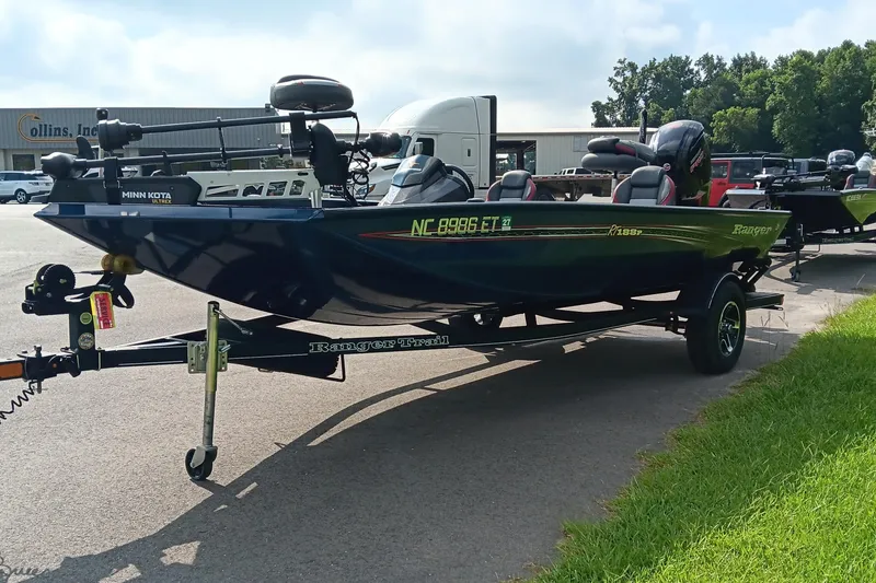 Slide: The Image of 2021 Ranger RT188P fishing boat on trailer, equipped with Minn Kota trolling motor. - 3