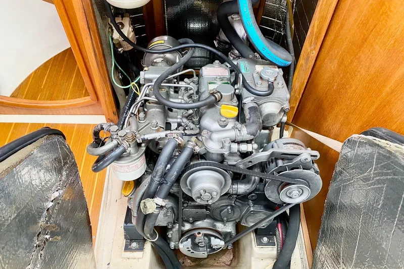 Slide: The Image of 2003 Hunter 386 engine compartment with visible components and wiring. - 40