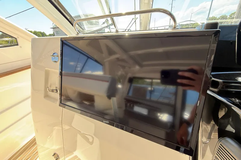 Slide: The Image of Interior of 2026 Solara S-310 SB yacht with mounted flat-screen TV. - 19