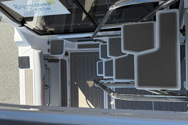 Slide: The Image of Solara S-310 SB 2026 boat deck with modern design and sleek steps. - 30
