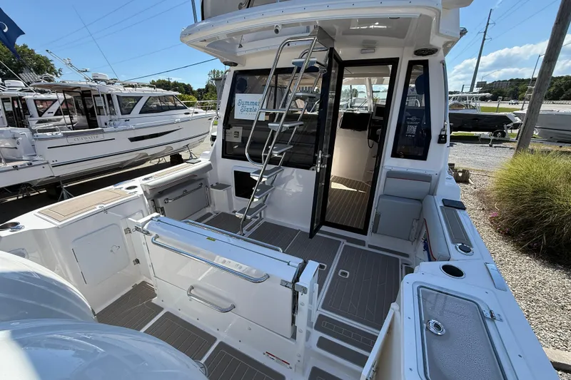 Slide: The Image of 2026 Solara S-310 SB boat interior with open deck and modern design features. - 9