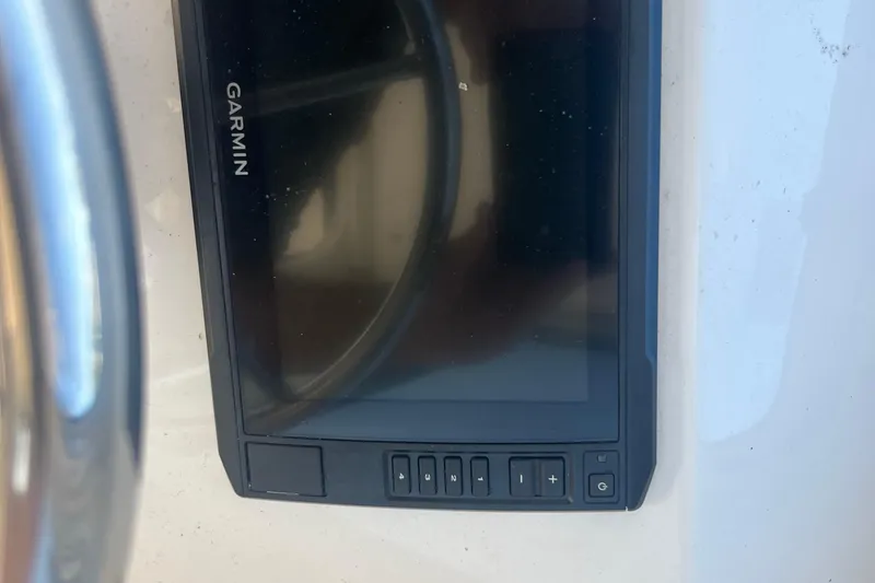 Slide: The Image of Garmin display on 2022 May-Craft 2300 Pilot House boat dashboard. - 9