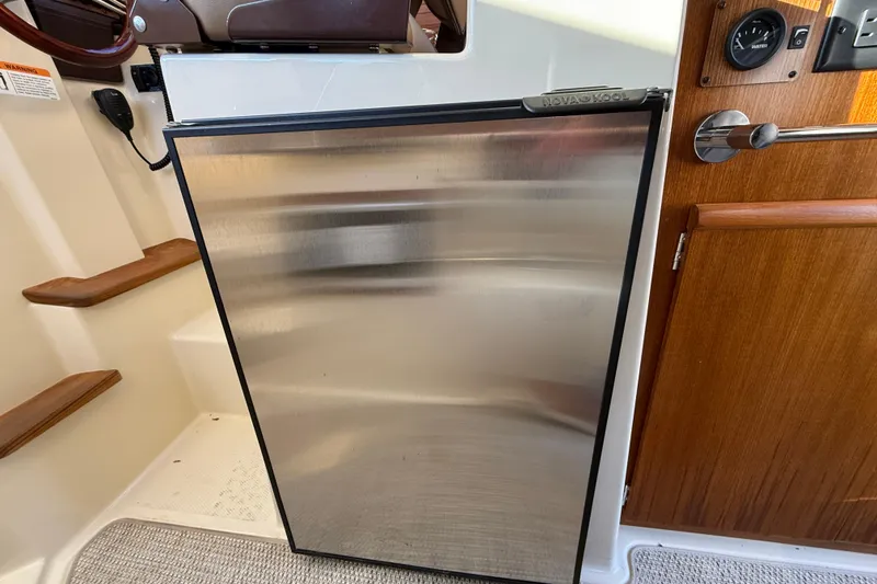 Slide: The Image of Stainless steel refrigerator in 2026 Ranger Tugs R-23 boat interior. - 15