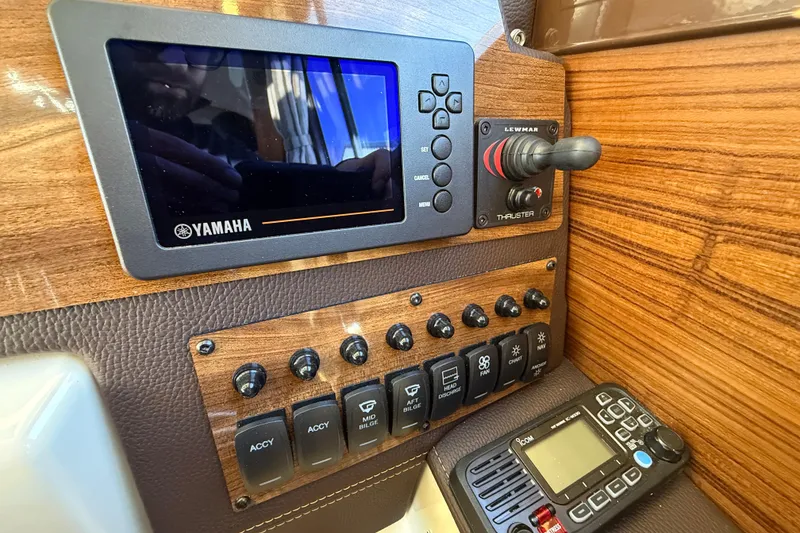 Slide: The Image of Control panel of 2026 Ranger Tugs R-23 with Yamaha display and Lewmar thruster. - 24