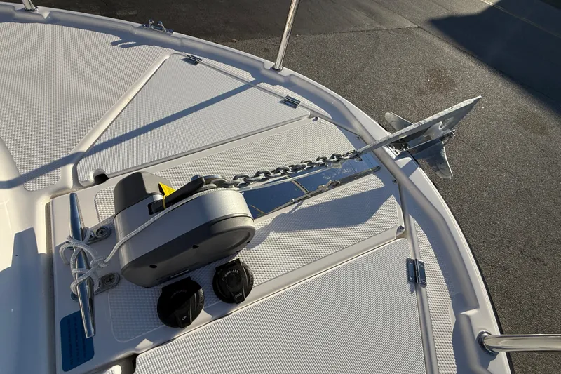 Slide: The Image of 2026 Ranger Tugs R-23 boat anchor system on deck, featuring a modern design. - 27