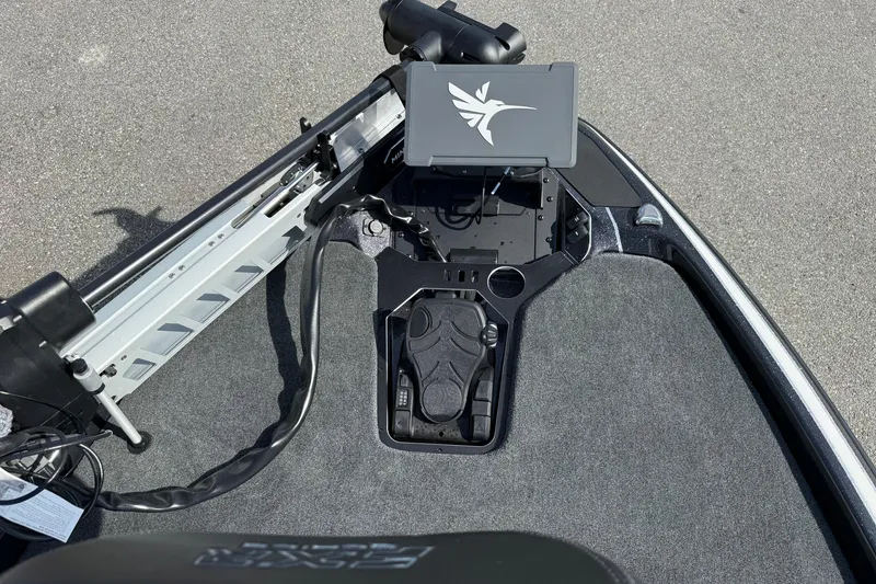 Slide: The Image of 2026 Skeeter FXR21 FLEX boat deck with advanced control panel and foot pedal. - 12