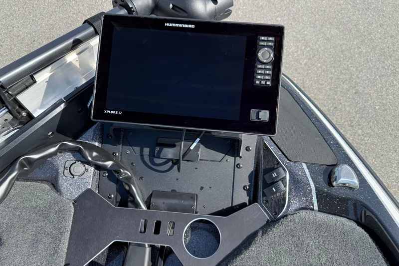 Slide: The Image of 2026 Skeeter FXR21 FLEX boat dashboard with Humminbird Xplore 12 display. - 14