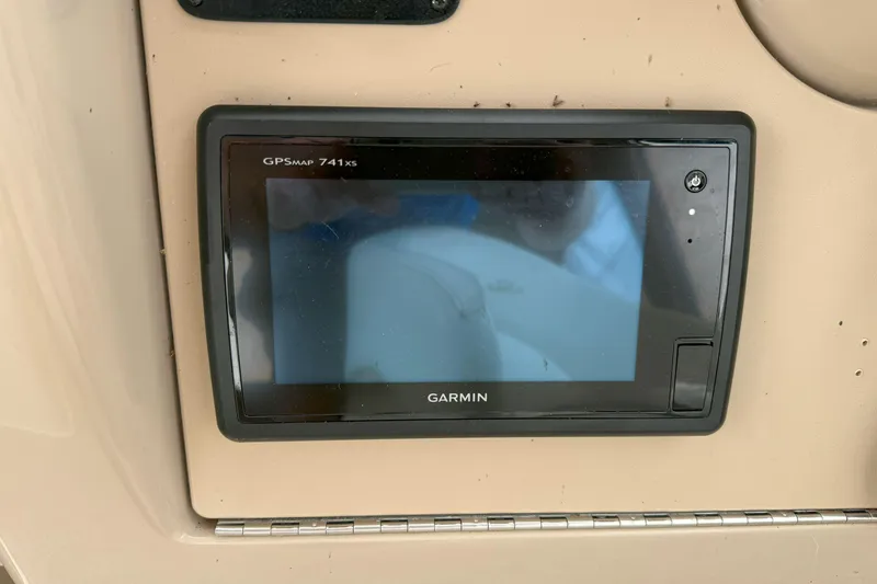 Slide: The Image of Garmin GPSMAP 741xs installed on 2003 Sea Ray 260 Sundancer boat dashboard. - 13