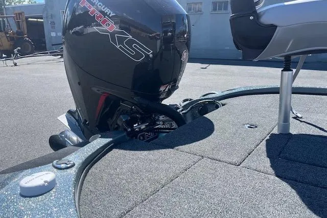 Slide: The Image of 2026 Nitro Z18 Pro boat with Mercury Pro XS engine on a sunny day. - 12