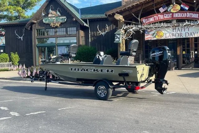 Slide: The Image of 2026 Tracker Pro Team 175 boat displayed outdoors on Labor Day. - 3