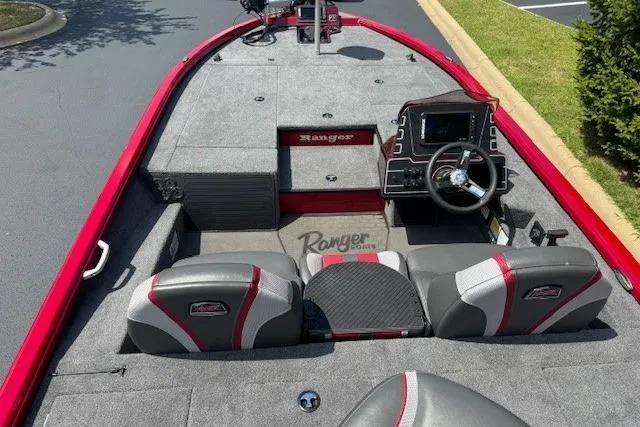 Slide: The Image of 2025 Ranger ALPHA 208 boat interior with modern dashboard and seating. - 3