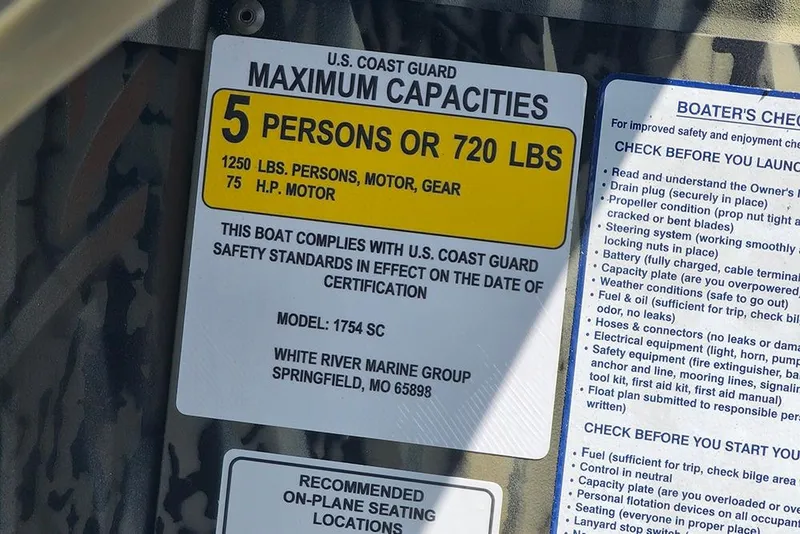 Slide: The Image of Tracker Grizzly 1754 SC 2026 boat capacity label, U.S. Coast Guard compliance details. - 14