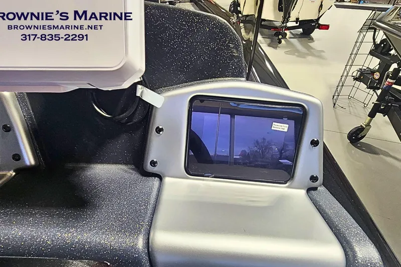 Slide: The Image of 2026 Tracker Pro Team 190 boat dashboard at Brownie's Marine showroom. - 10