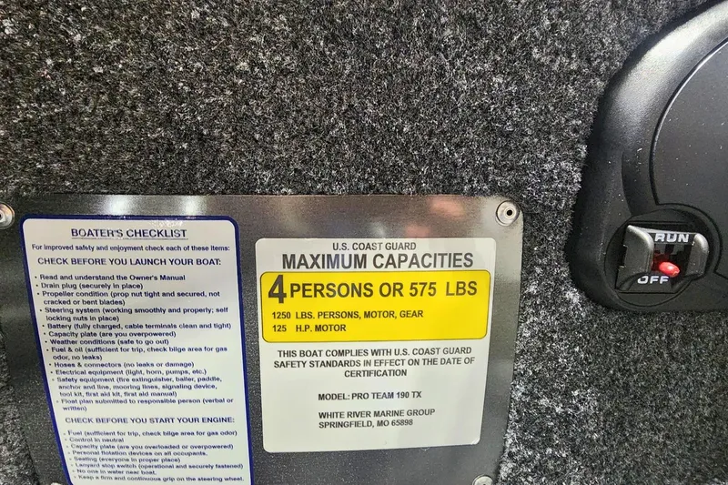 Slide: The Image of Tracker Pro Team 190 boat capacity label, 2026 model, showing maximum capacity and boater's checklist. - 11