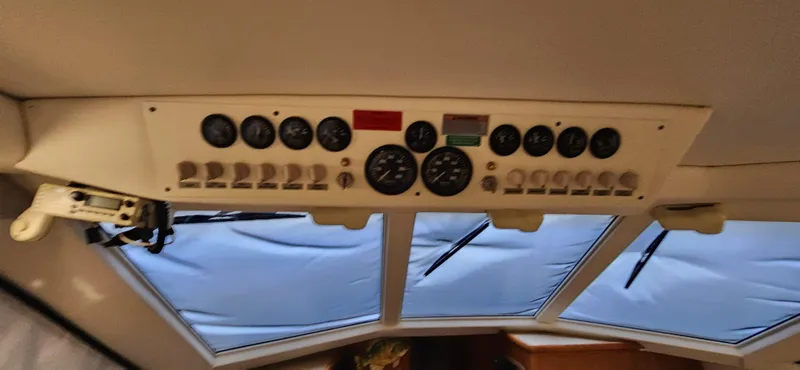 Slide: The Image of Control panel of 1998 Carver 355 Aft Cabin Motor Yacht cockpit. - 19