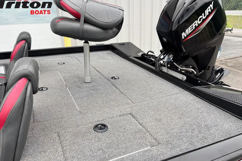 Slide: The Image of 2023 Ranger RT178 boat deck with Mercury engine and Triton Boats branding. - 10