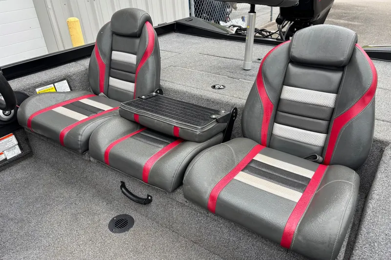 Slide: The Image of 2023 Ranger RT178 boat interior with gray and red seats, featuring modern design. - 7