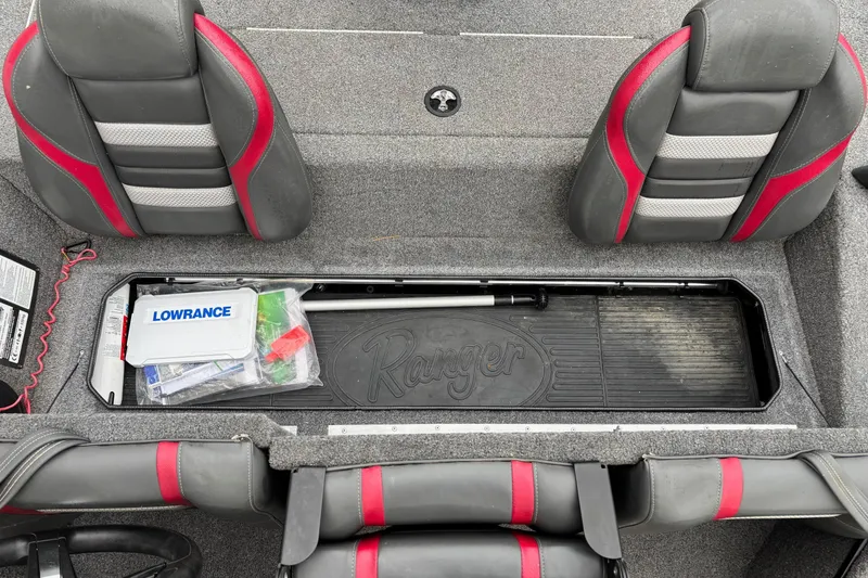 Slide: The Image of 2023 Ranger RT178 boat interior with storage compartment and Lowrance equipment. - 8