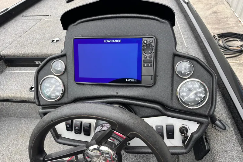 Slide: The Image of Dashboard of 2023 Ranger RT178 boat with Lowrance HDS display and gauges. - 9