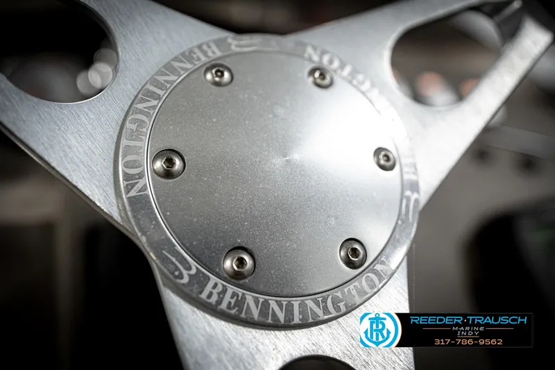 Slide: The Image of Close-up of a 2006 Bennington 2250RL steering wheel with Reeder-Trausch Marine logo. - 30
