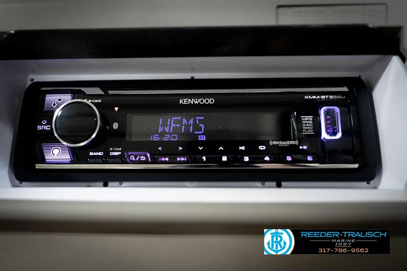 Slide: The Image of Kenwood stereo system in a 2006 Bennington 2250RL boat, displaying "WFMS" station. - 31