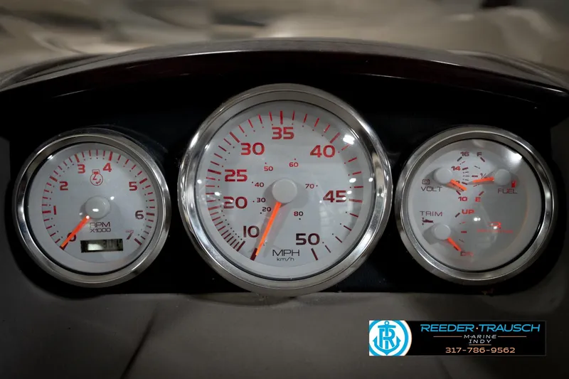 Slide: The Image of Dashboard gauges of a 2006 Bennington 2250RL boat, featuring speedometer and RPM indicators. - 33