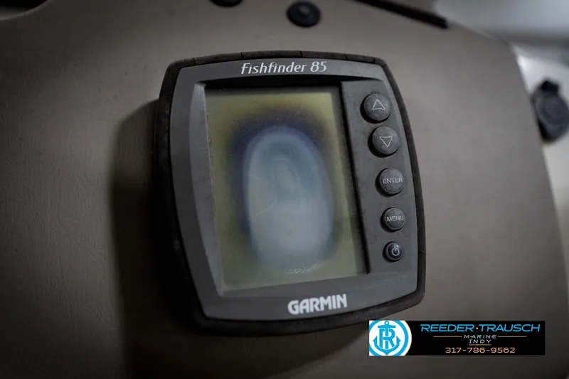 Slide: The Image of Garmin Fishfinder 85 on 2006 Bennington 2250RL boat dashboard, Reeder-Trausch Marine logo visible. - 36