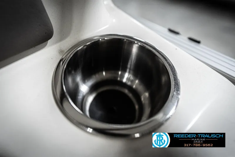 Slide: The Image of Stainless steel cup holder on 2006 Bennington 2250RL boat, Reeder-Trausch Marine logo visible. - 45
