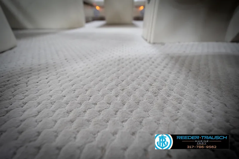 Slide: The Image of Close-up of textured carpet in a 2006 Bennington 2250RL boat interior. - 47