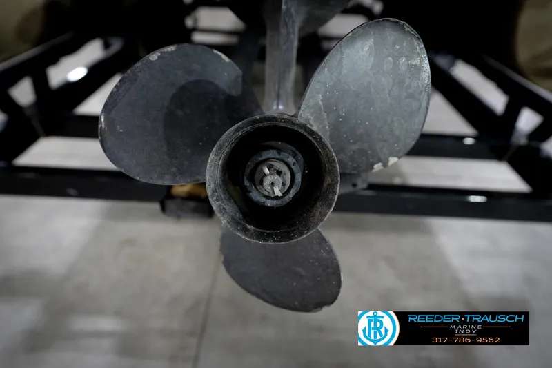 Slide: The Image of Close-up of a 2006 Bennington 2250RL boat propeller in a showroom. - 51
