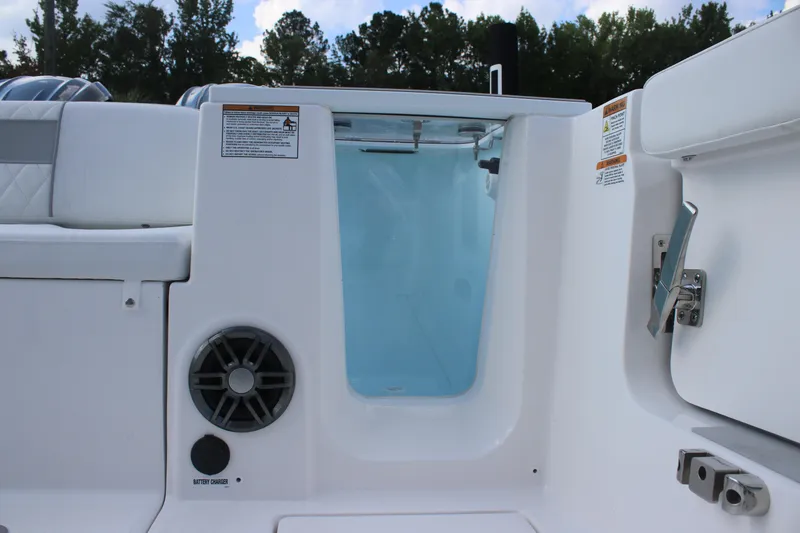 Slide: The Image of 2026 Sea Fox 268 Commander boat interior with speaker and storage compartment. - 18