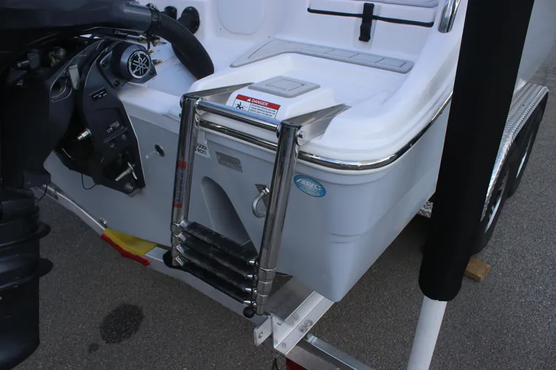 Slide: The Image of 2026 Sea Fox 268 Commander boat with ladder and motor detail. - 6