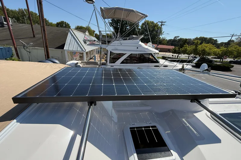 Slide: The Image of 2026 Ranger Tugs R-25 with solar panel on deck, docked in marina. - 28