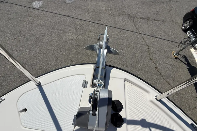 Slide: The Image of Bow view of 2026 Ranger Tugs R-25 with anchor and deck details. - 29