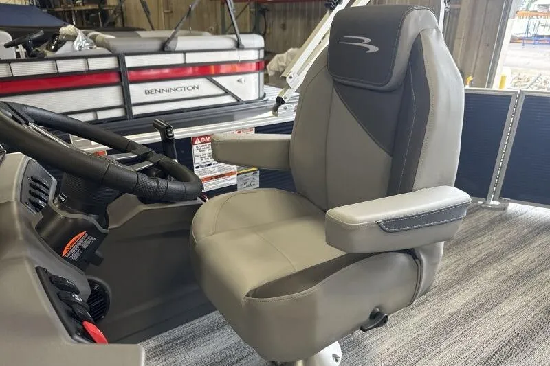 Slide: The Image of Captain's chair in 2026 Bennington 23SL pontoon boat interior, featuring sleek design and comfort. - 10
