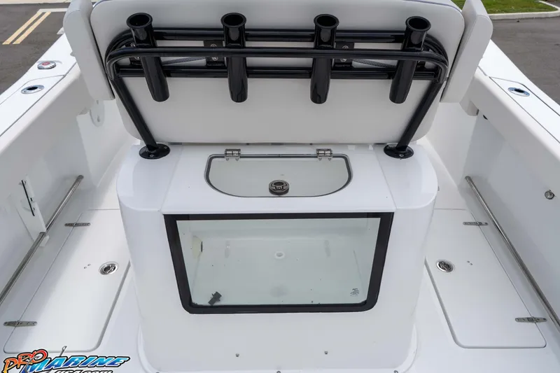 Slide: The Image of 2026 Sea Hunt Gamefish 25 boat with rod holders and livewell. - 19