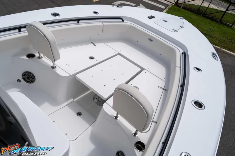 Slide: The Image of 2026 Sea Hunt Gamefish 25 boat interior with seating and storage compartments. - 29