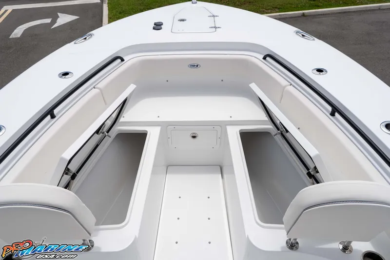 Slide: The Image of 2026 Sea Hunt Gamefish 25 boat interior with open storage compartments. - 36