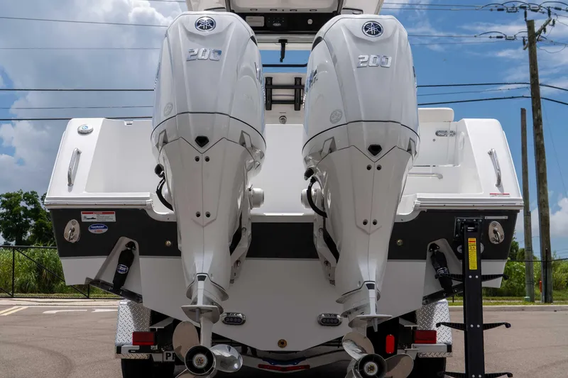 Slide: The Image of 2026 Sea Hunt Gamefish 25 with dual Yamaha 200 engines, rear view. - 8