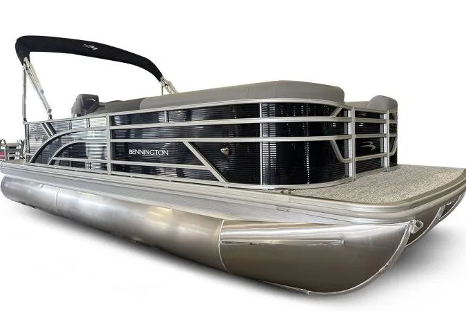 Slide: The Image of 2026 Bennington 23SL pontoon boat with sleek design and modern features. - 5