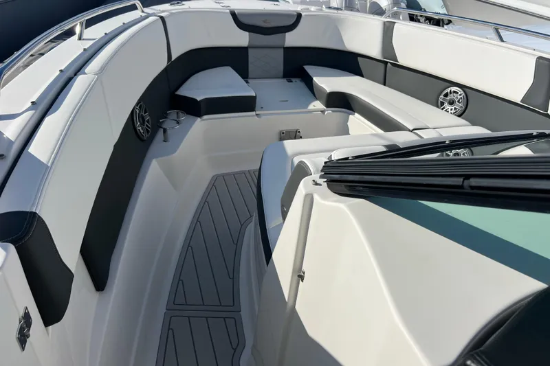Slide: The Image of 2020 Chaparral 280 OSX boat interior with sleek seating and modern design. - 13