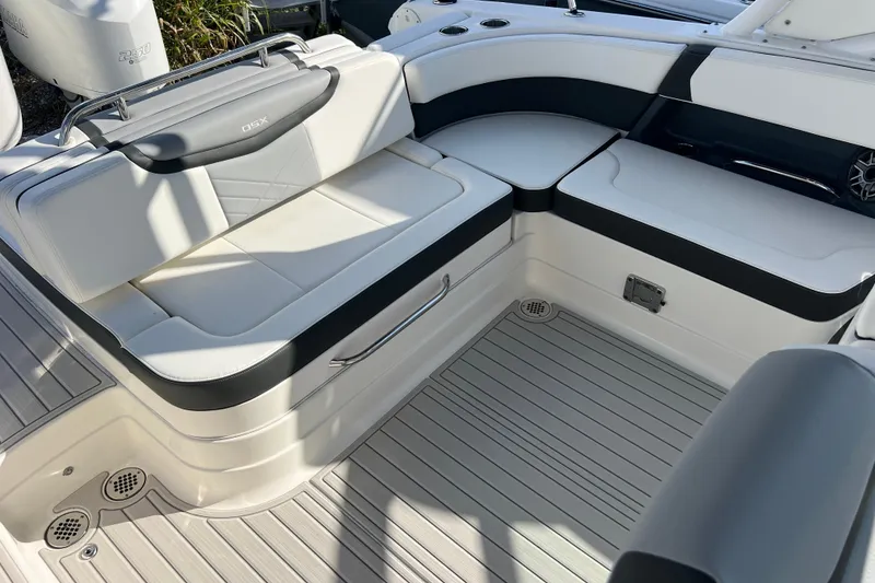 Slide: The Image of 2020 Chaparral 280 OSX boat interior with white seating and sleek design. - 22
