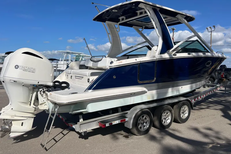 Slide: The Image of 2020 Chaparral 280 OSX boat on trailer with Yamaha outboard motor. - 3
