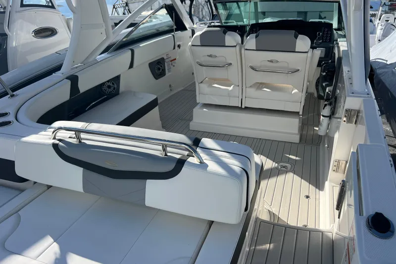 Slide: The Image of 2020 Chaparral 280 OSX boat interior with sleek seating and modern design. - 8